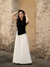 You can wear wide-leg pants with a linen blazer.